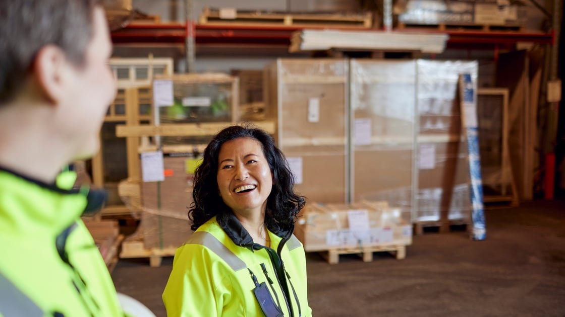 female-warehouse-worker-smiling